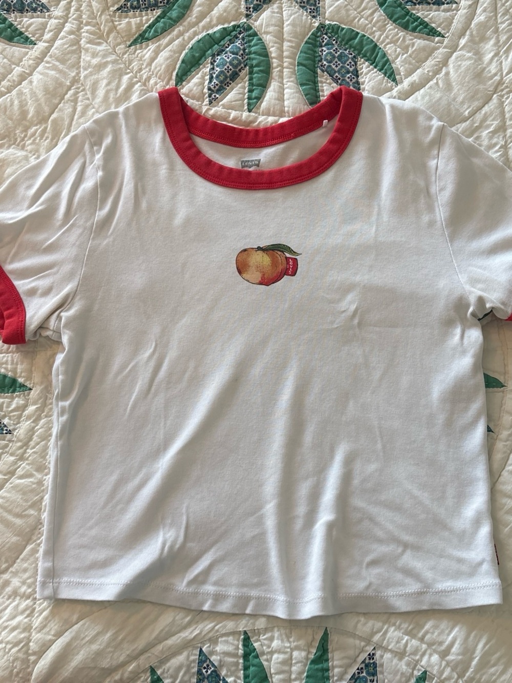 Levi’s Women’s White Ringer Tee with Red Trim and Peach Graphic
